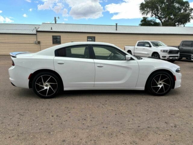 Белый Додж Чарджер, объемом двигателя 3.6 л и пробегом 42 тыс. км за 12000 $, фото 2 на Automoto.ua