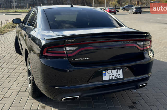 Черный Додж Чарджер, объемом двигателя 3.6 л и пробегом 208 тыс. км за 18300 $, фото 3 на Automoto.ua