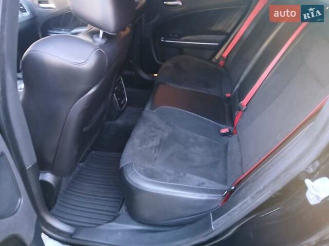 Черный Додж Чарджер, объемом двигателя 6.41 л и пробегом 80 тыс. км за 33000 $, фото 8 на Automoto.ua