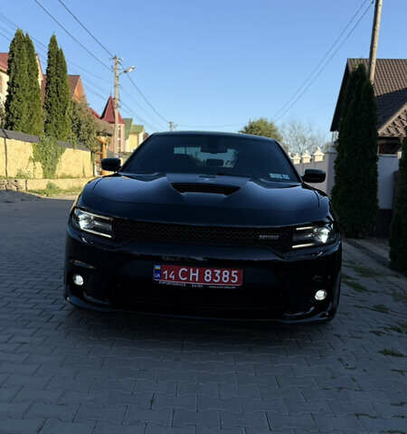 Черный Додж Чарджер, объемом двигателя 5.7 л и пробегом 60 тыс. км за 29999 $, фото 1 на Automoto.ua