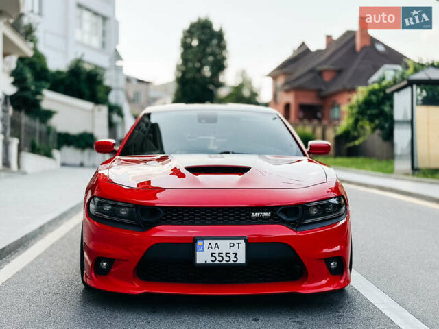 Красный Додж Чарджер, объемом двигателя 6.4 л и пробегом 76 тыс. км за 34900 $, фото 1 на Automoto.ua