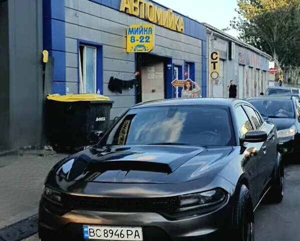 Серый Додж Чарджер, объемом двигателя 5.7 л и пробегом 148 тыс. км за 22000 $, фото 1 на Automoto.ua