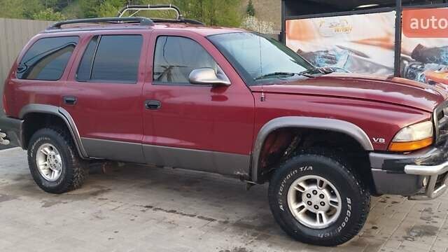 Красный Додж Дюранго, объемом двигателя 5.2 л и пробегом 185 тыс. км за 10000 $, фото 9 на Automoto.ua