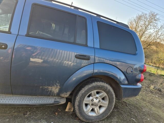 Синій Додж Durango, об'ємом двигуна 4 л та пробігом 260 тис. км за 4955 $, фото 2 на Automoto.ua