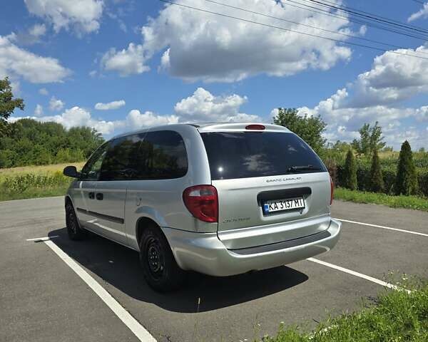 Серый Додж Гранд Караван, объемом двигателя 3.3 л и пробегом 68 тыс. км за 8600 $, фото 1 на Automoto.ua