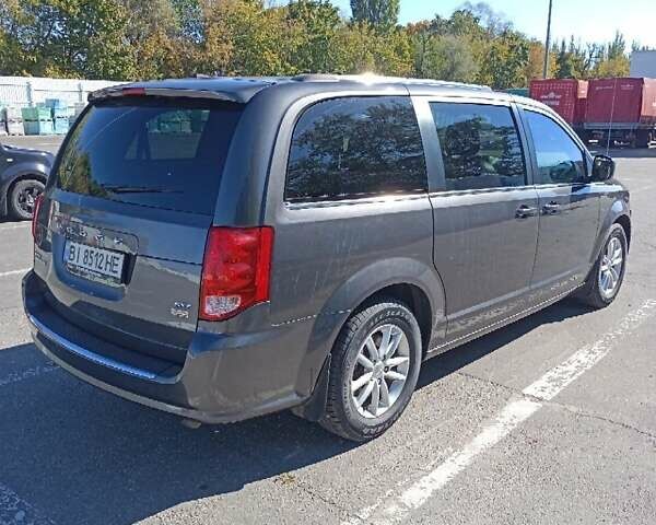 Серый Додж Гранд Караван, объемом двигателя 3.6 л и пробегом 130 тыс. км за 14500 $, фото 3 на Automoto.ua