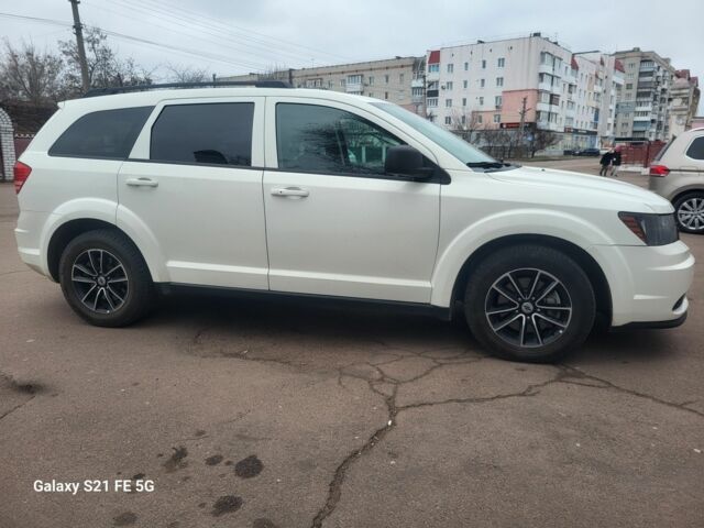 Белый Додж Джорни, объемом двигателя 2.4 л и пробегом 65 тыс. км за 11900 $, фото 2 на Automoto.ua