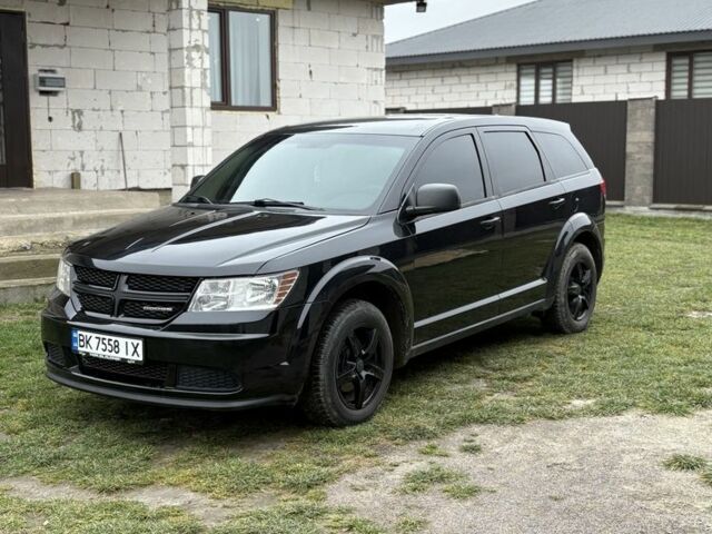 Черный Додж Джорни, объемом двигателя 2.4 л и пробегом 310 тыс. км за 9700 $, фото 1 на Automoto.ua