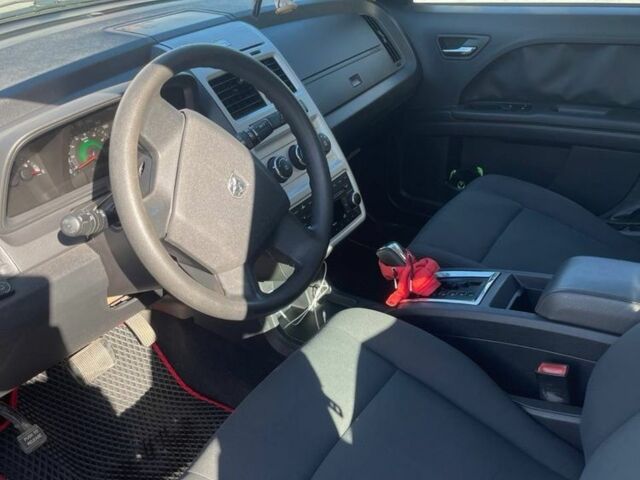 Черный Додж Джорни, объемом двигателя 2.4 л и пробегом 210 тыс. км за 7500 $, фото 1 на Automoto.ua