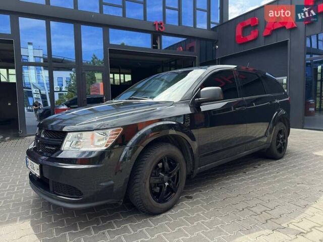Черный Додж Джорни, объемом двигателя 2.4 л и пробегом 305 тыс. км за 8700 $, фото 1 на Automoto.ua
