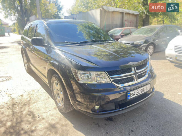 Черный Додж Джорни, объемом двигателя 2.36 л и пробегом 145 тыс. км за 9500 $, фото 1 на Automoto.ua