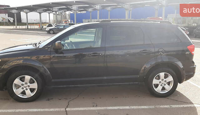 Черный Додж Джорни, объемом двигателя 2.4 л и пробегом 249 тыс. км за 9600 $, фото 1 на Automoto.ua