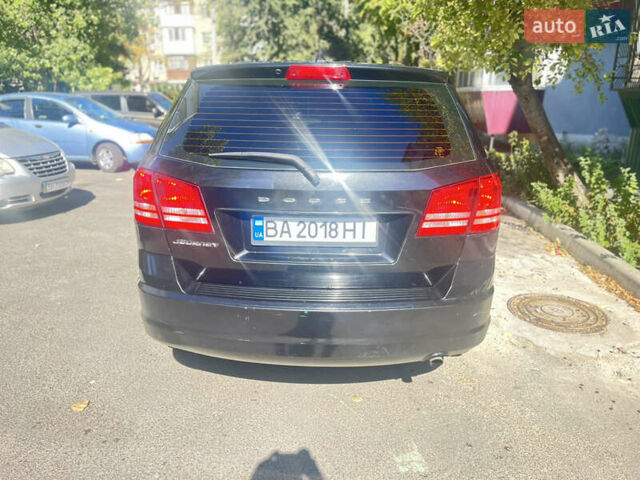 Черный Додж Джорни, объемом двигателя 2.36 л и пробегом 145 тыс. км за 9500 $, фото 2 на Automoto.ua