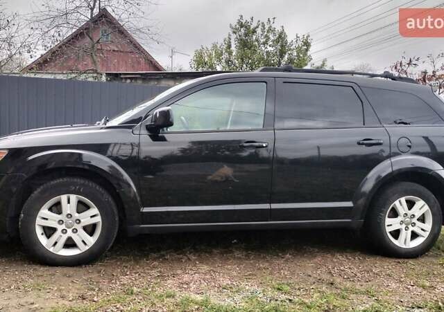 Черный Додж Джорни, объемом двигателя 2.4 л и пробегом 149 тыс. км за 8000 $, фото 1 на Automoto.ua