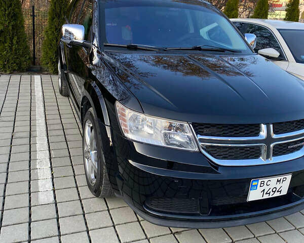 Черный Додж Джорни, объемом двигателя 2.36 л и пробегом 157 тыс. км за 11659 $, фото 3 на Automoto.ua