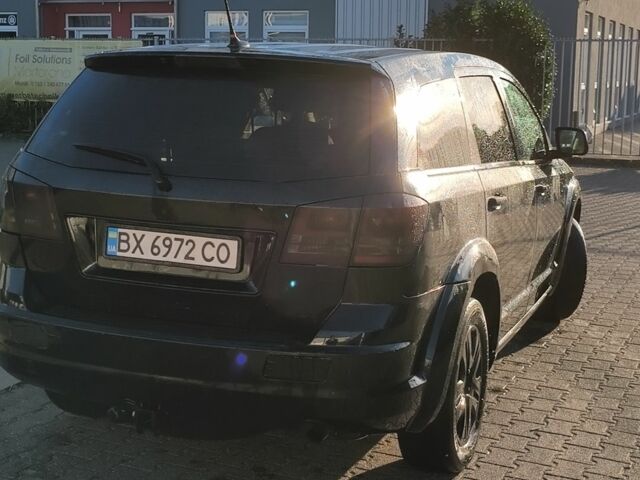 Черный Додж Джорни, объемом двигателя 2.4 л и пробегом 274 тыс. км за 8466 $, фото 1 на Automoto.ua