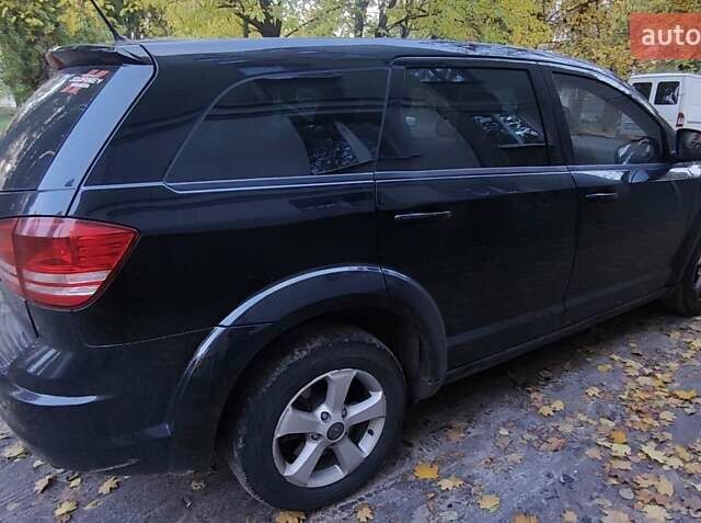 Черный Додж Джорни, объемом двигателя 2.36 л и пробегом 292 тыс. км за 9100 $, фото 4 на Automoto.ua