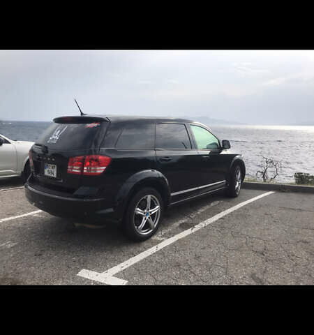 Черный Додж Джорни, объемом двигателя 2.36 л и пробегом 157 тыс. км за 11659 $, фото 2 на Automoto.ua