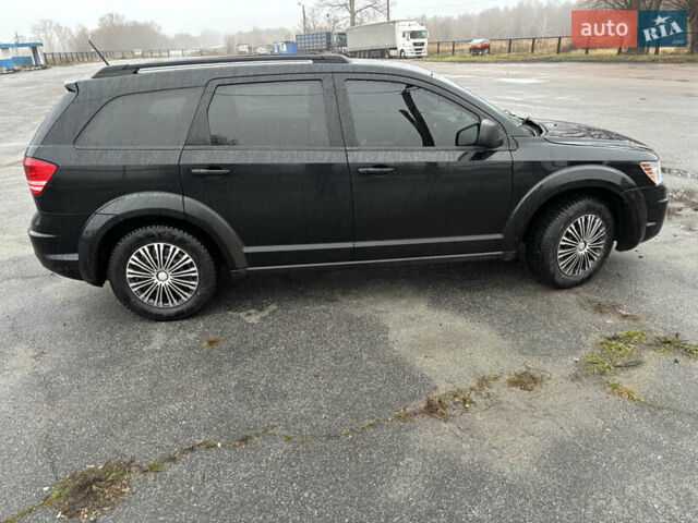 Черный Додж Джорни, объемом двигателя 2.36 л и пробегом 210 тыс. км за 9900 $, фото 1 на Automoto.ua