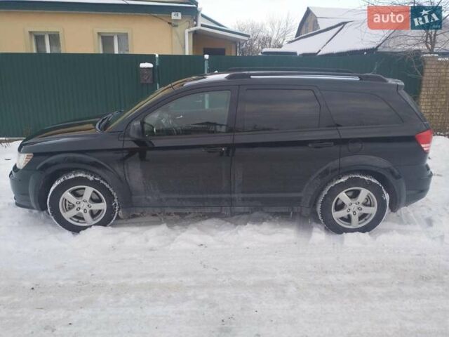 Черный Додж Джорни, объемом двигателя 2.36 л и пробегом 110 тыс. км за 11600 $, фото 2 на Automoto.ua