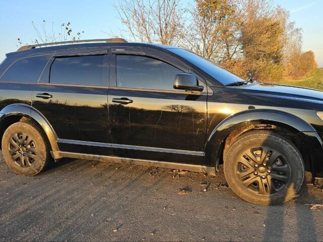 Черный Додж Джорни, объемом двигателя 2.4 л и пробегом 250 тыс. км за 10150 $, фото 1 на Automoto.ua