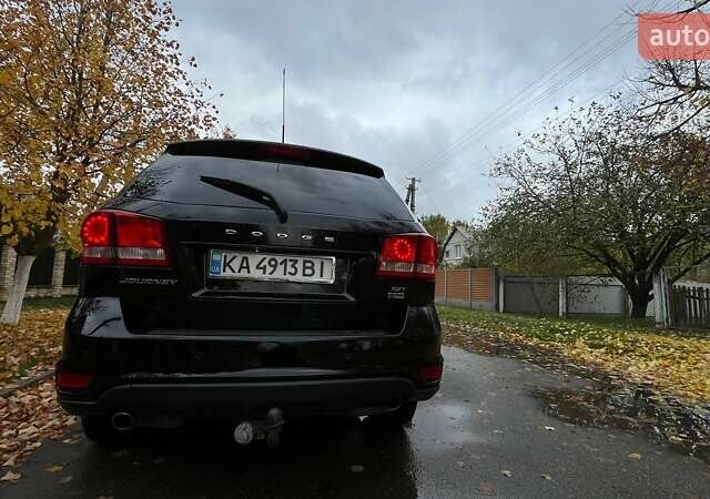 Черный Додж Джорни, объемом двигателя 3.6 л и пробегом 151 тыс. км за 12900 $, фото 1 на Automoto.ua