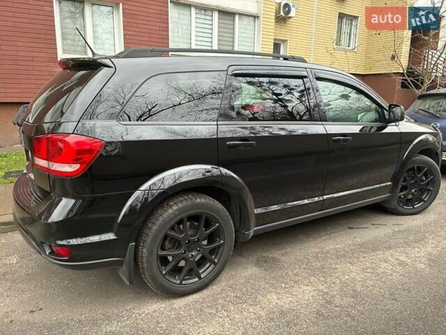 Черный Додж Джорни, объемом двигателя 2.36 л и пробегом 352 тыс. км за 9000 $, фото 2 на Automoto.ua