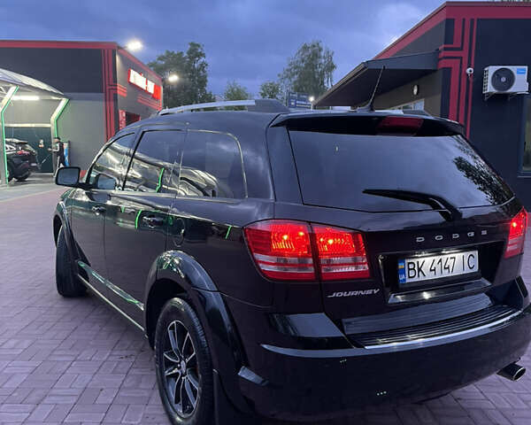 Черный Додж Джорни, объемом двигателя 2.36 л и пробегом 151 тыс. км за 12799 $, фото 3 на Automoto.ua