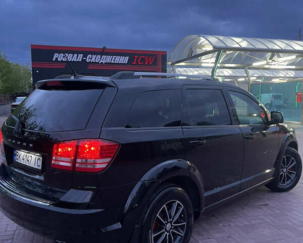 Черный Додж Джорни, объемом двигателя 2.36 л и пробегом 151 тыс. км за 12799 $, фото 2 на Automoto.ua