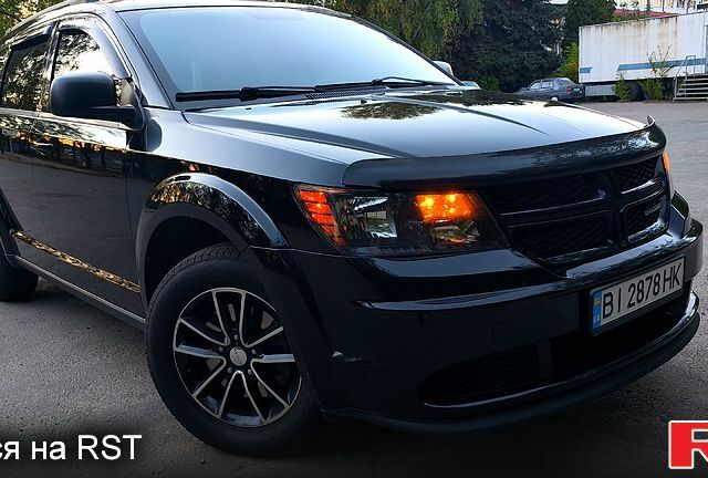 Черный Додж Джорни, объемом двигателя 2.4 л и пробегом 153 тыс. км за 11900 $, фото 1 на Automoto.ua