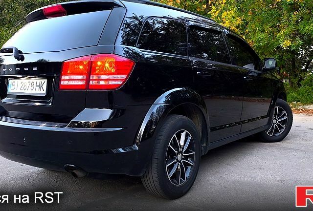 Черный Додж Джорни, объемом двигателя 2.4 л и пробегом 153 тыс. км за 11900 $, фото 3 на Automoto.ua