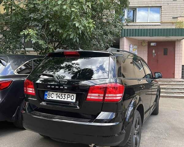 Черный Додж Джорни, объемом двигателя 2.36 л и пробегом 122 тыс. км за 12000 $, фото 1 на Automoto.ua