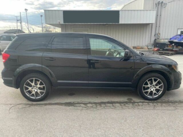 Черный Додж Джорни, объемом двигателя 3.6 л и пробегом 35 тыс. км за 5000 $, фото 2 на Automoto.ua