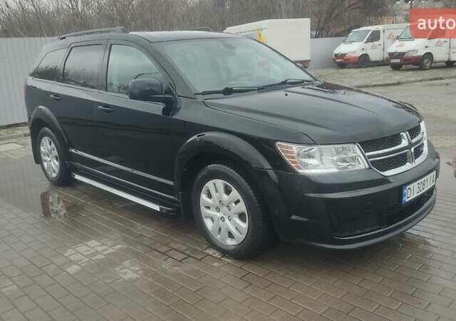 Черный Додж Джорни, объемом двигателя 2.36 л и пробегом 239 тыс. км за 8950 $, фото 1 на Automoto.ua