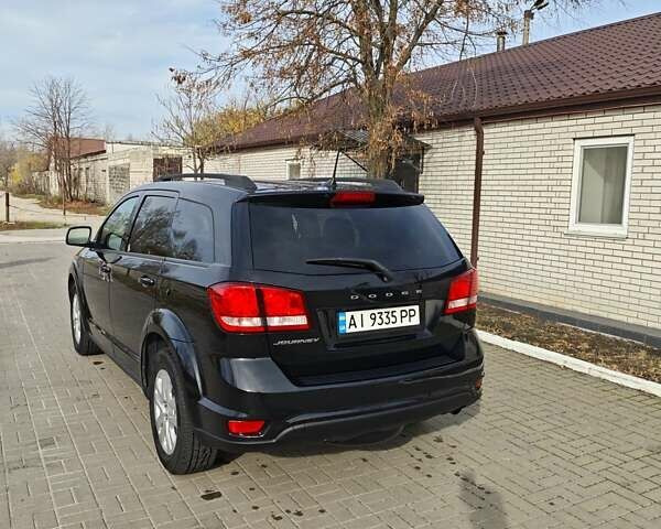 Чорний Додж Джорні, об'ємом двигуна 2.36 л та пробігом 209 тис. км за 13200 $, фото 8 на Automoto.ua