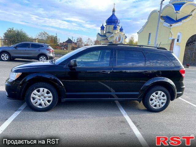 Черный Додж Джорни, объемом двигателя 2.4 л и пробегом 69 тыс. км за 13300 $, фото 1 на Automoto.ua