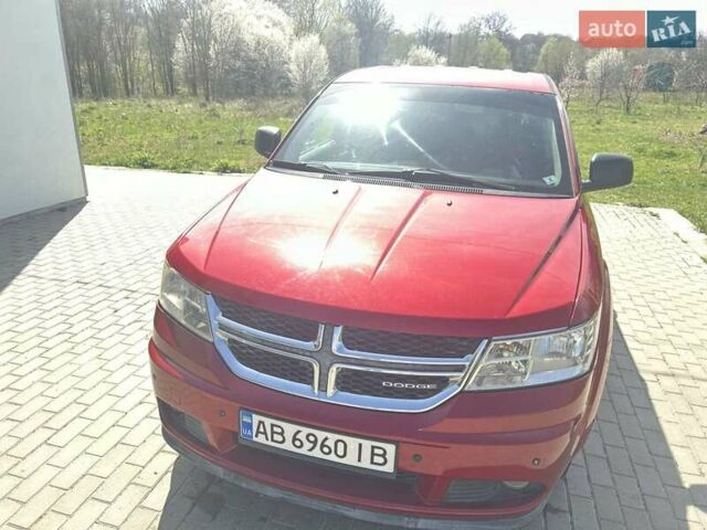 Красный Додж Джорни, объемом двигателя 2.36 л и пробегом 174 тыс. км за 9500 $, фото 1 на Automoto.ua