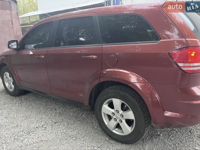 Красный Додж Джорни, объемом двигателя 2.4 л и пробегом 235 тыс. км за 9500 $, фото 3 на Automoto.ua