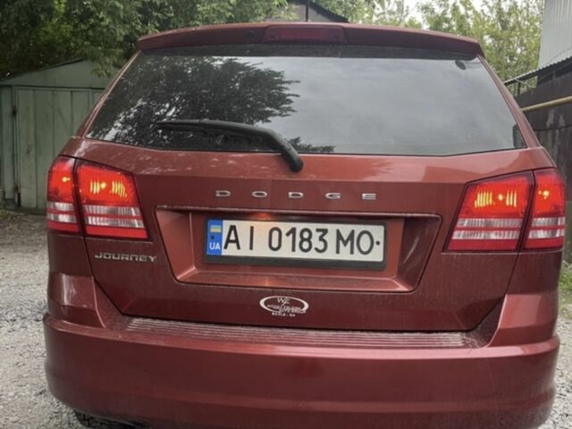 Красный Додж Джорни, объемом двигателя 2.4 л и пробегом 235 тыс. км за 9500 $, фото 2 на Automoto.ua
