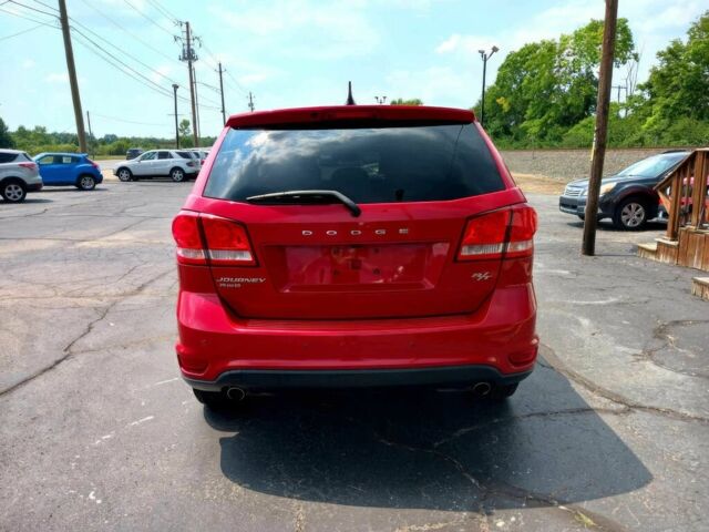 Красный Додж Джорни, объемом двигателя 3.6 л и пробегом 79 тыс. км за 7000 $, фото 3 на Automoto.ua
