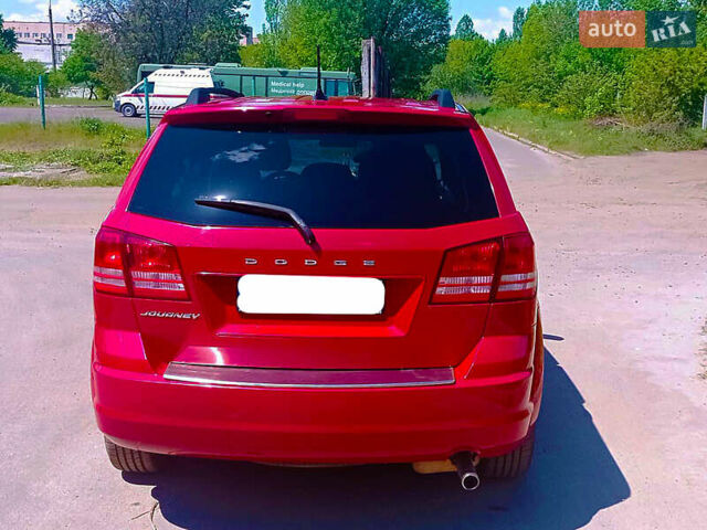 Красный Додж Джорни, объемом двигателя 2.36 л и пробегом 133 тыс. км за 10500 $, фото 1 на Automoto.ua