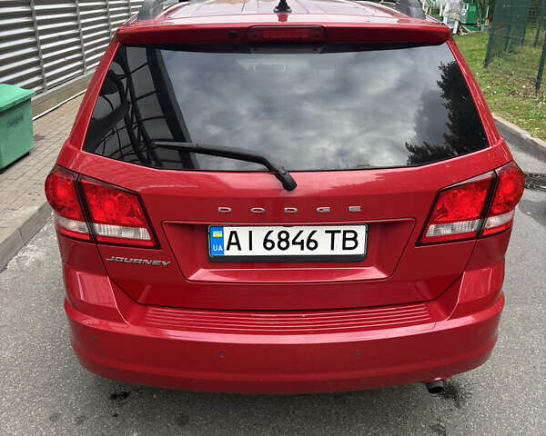 Красный Додж Джорни, объемом двигателя 2.36 л и пробегом 225 тыс. км за 10500 $, фото 1 на Automoto.ua