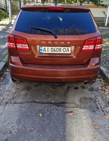 Помаранчевий Додж Джорні, об'ємом двигуна 2.4 л та пробігом 279 тис. км за 9500 $, фото 2 на Automoto.ua