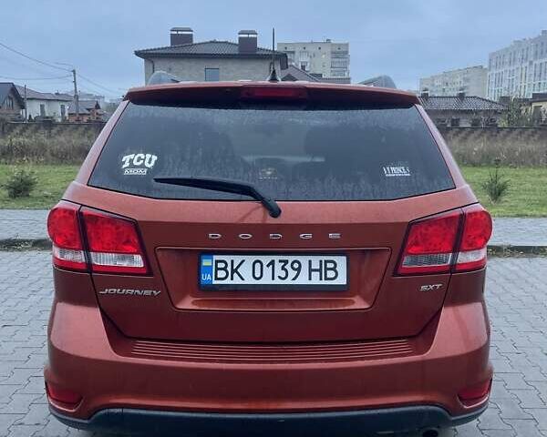 Оранжевый Додж Джорни, объемом двигателя 2.36 л и пробегом 250 тыс. км за 8100 $, фото 4 на Automoto.ua