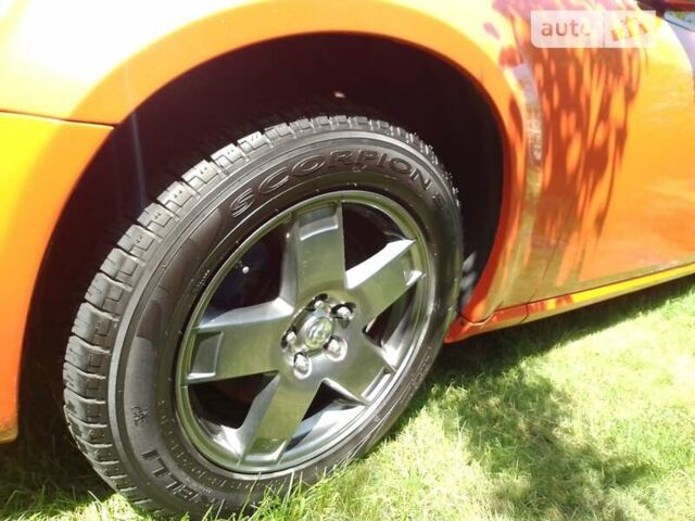 Оранжевый Додж Магнум, объемом двигателя 3.5 л и пробегом 243 тыс. км за 7500 $, фото 13 на Automoto.ua