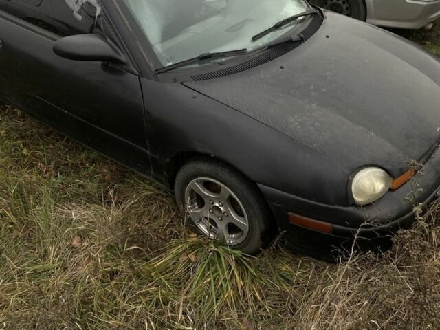 Черный Додж Неон, объемом двигателя 2 л и пробегом 250 тыс. км за 1250 $, фото 1 на Automoto.ua