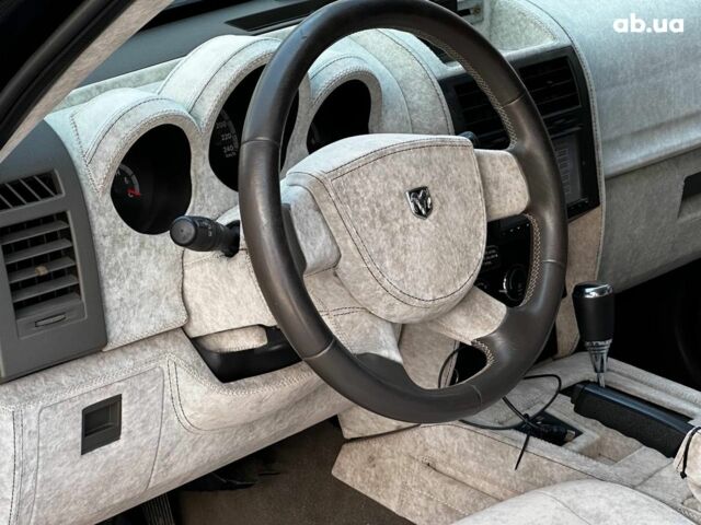 Чорний Додж Nitro, об'ємом двигуна 2.8 л та пробігом 320 тис. км за 8690 $, фото 14 на Automoto.ua