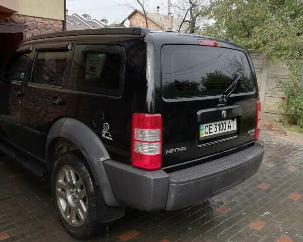 Чорний Додж Nitro, об'ємом двигуна 2.8 л та пробігом 230 тис. км за 10500 $, фото 3 на Automoto.ua