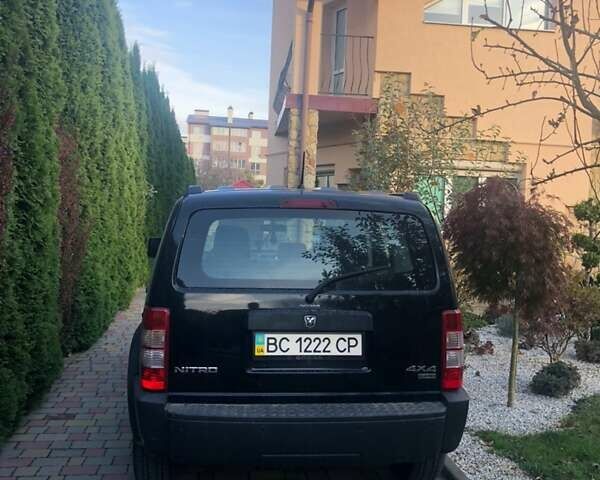 Чорний Додж Nitro, об'ємом двигуна 2.8 л та пробігом 133 тис. км за 9700 $, фото 1 на Automoto.ua