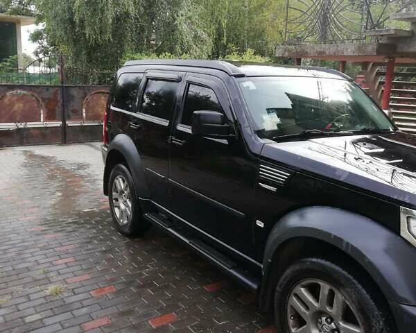 Чорний Додж Nitro, об'ємом двигуна 2.8 л та пробігом 230 тис. км за 10500 $, фото 1 на Automoto.ua